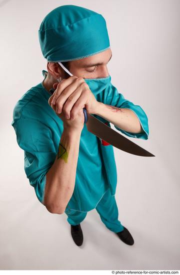 Man Adult Average White Fighting with knife Standing poses Casual