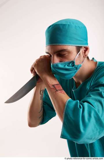 Man Adult Average White Fighting with knife Standing poses Casual