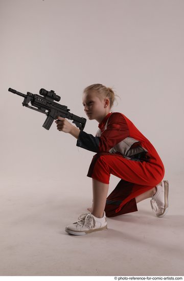 Woman Young Athletic White Fighting with gun Kneeling poses Army