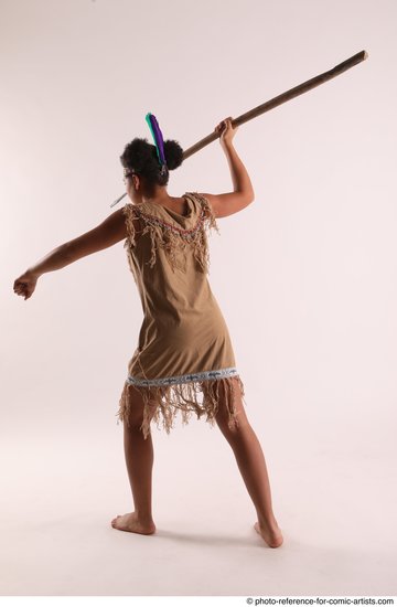 Woman Young Average Black Fighting with spear Standing poses Casual