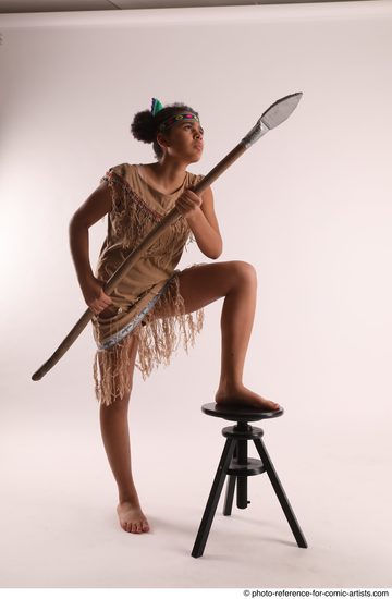 Woman Young Average Black Fighting with spear Standing poses Casual