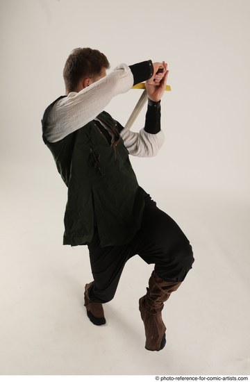 Man Adult Athletic White Fighting with sword Moving poses Casual