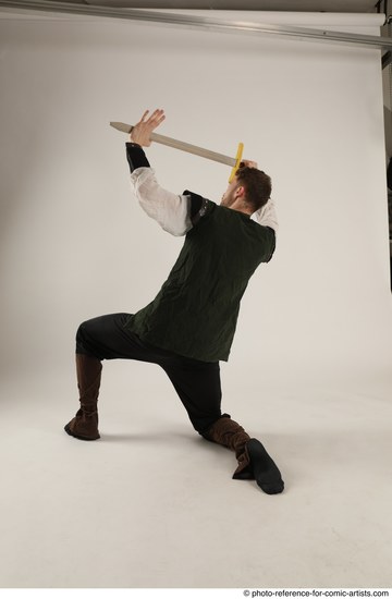 Man Adult Athletic White Fighting with sword Kneeling poses Casual