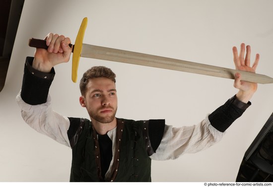 Man Adult Athletic White Fighting with sword Kneeling poses Casual