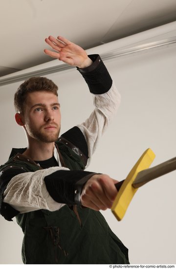 Man Adult Athletic White Fighting with sword Standing poses Casual