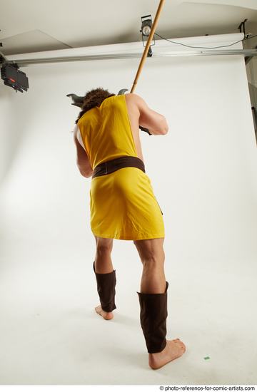 Man Adult Average Fighting with spear Standing poses Casual