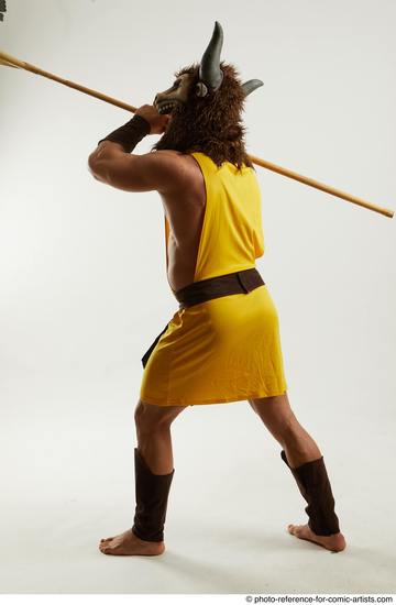 Man Adult Average White Fighting with spear Standing poses Casual