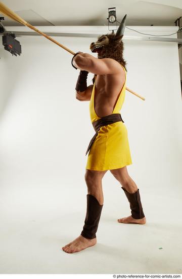 Man Adult Average White Fighting with spear Standing poses Casual