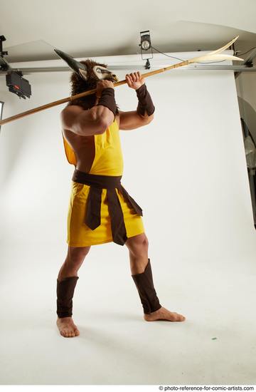 Man Adult Average White Fighting with spear Standing poses Casual