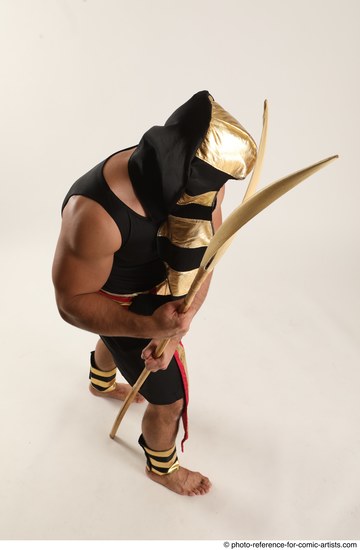 Man Adult Muscular Fighting with spear Standing poses Casual Latino