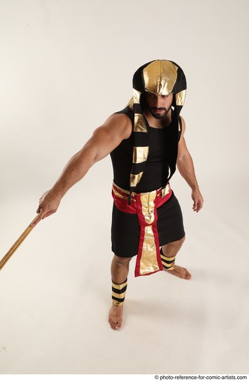 Man Adult Muscular Fighting with spear Standing poses Casual Latino