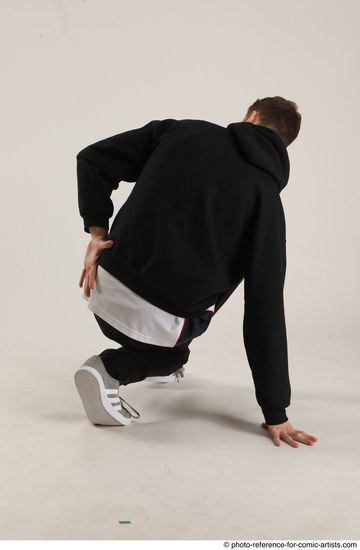 Man Adult Athletic White Kneeling poses Sportswear Dance