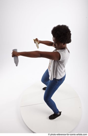 Woman Adult Athletic Black Fighting with knife Fight Casual