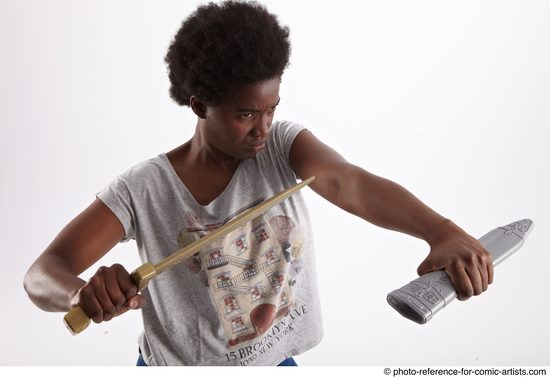 Woman Adult Athletic Black Fighting with knife Fight Casual