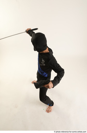 Man Young Athletic Fighting with sword Standing poses Casual Asian