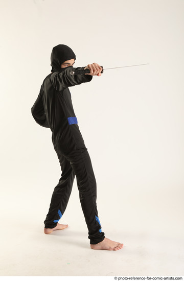 Man Young Athletic Fighting with sword Standing poses Casual Asian