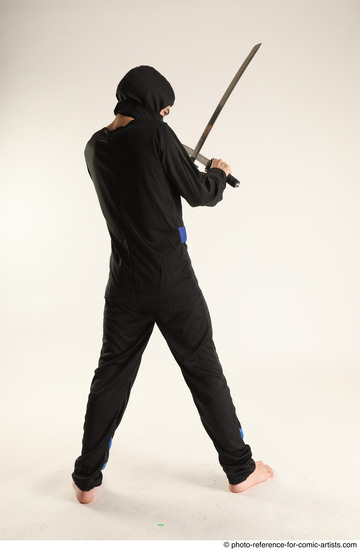 Man Young Athletic Fighting with sword Standing poses Casual Asian