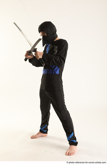 Man Young Athletic Fighting with sword Standing poses Casual Asian