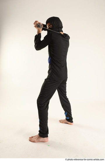 Man Young Athletic Fighting with sword Standing poses Casual Asian