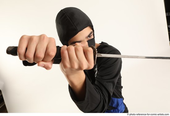 Man Young Athletic Fighting with sword Standing poses Casual Asian