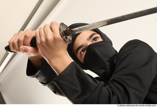 Man Young Athletic Fighting with sword Standing poses Casual Asian