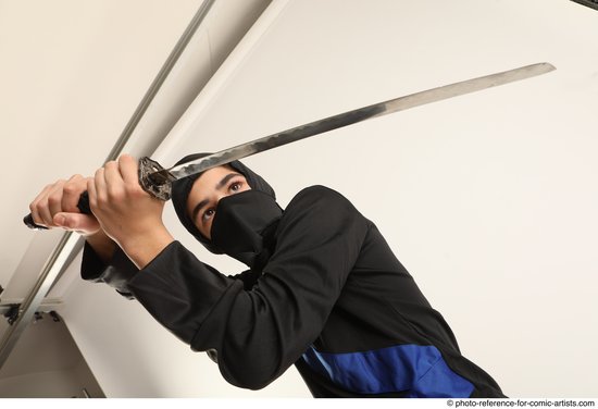 Man Young Athletic Fighting with sword Standing poses Casual Asian