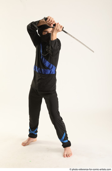 Man Young Athletic Fighting with sword Standing poses Casual Asian