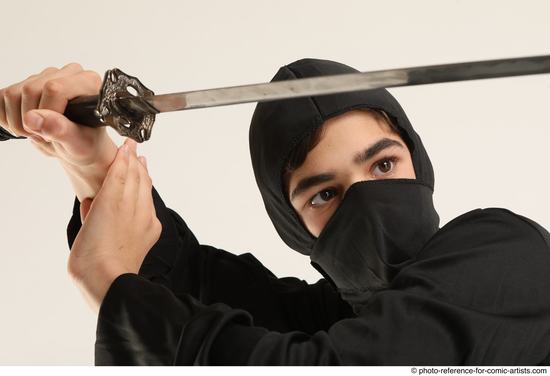 Man Young Athletic Fighting with sword Standing poses Casual Asian