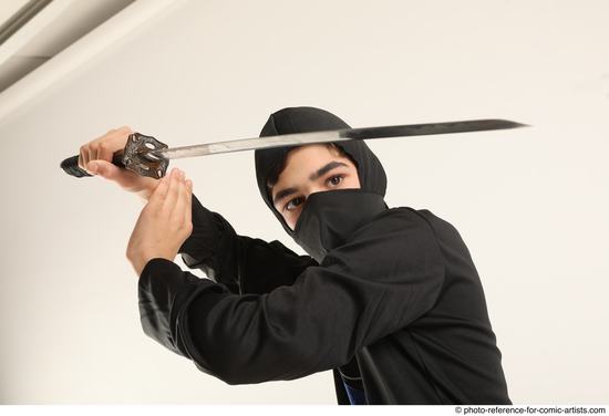 Man Young Athletic Fighting with sword Standing poses Casual Asian