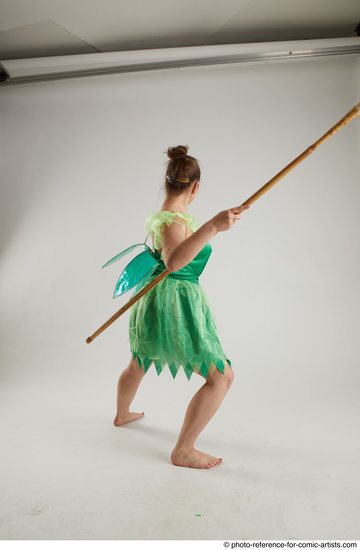 Woman Adult Average White Fighting with spear Standing poses Casual