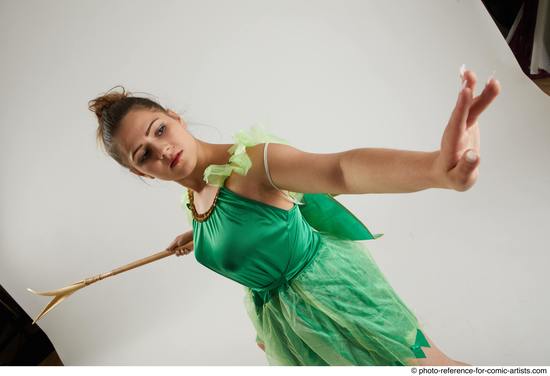 Woman Adult Average White Fighting with spear Standing poses Casual