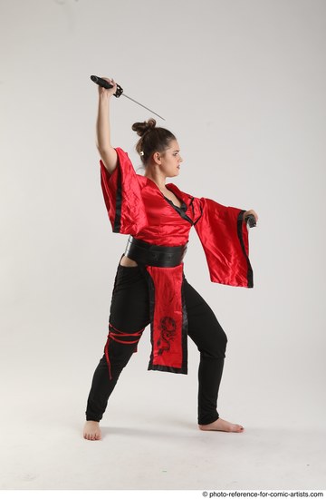 Woman Adult Average Fighting with sword Standing poses Coat Latino