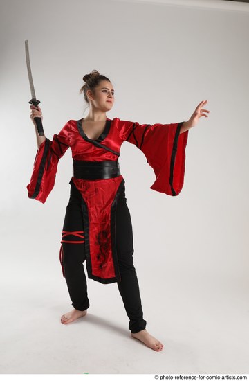 Woman Adult Average Martial art Standing poses Casual Latino