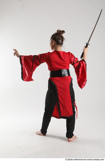 Woman Adult Average Martial art Standing poses Casual Latino