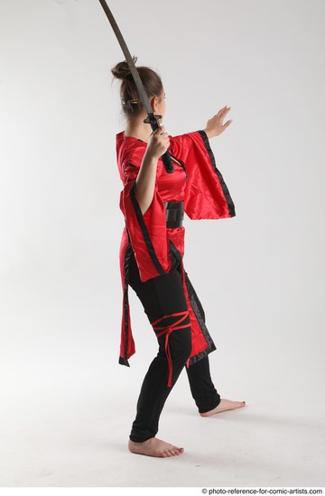 Woman Adult Average Martial art Standing poses Casual Latino