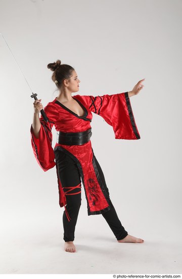 Woman Adult Average Martial art Standing poses Casual Latino