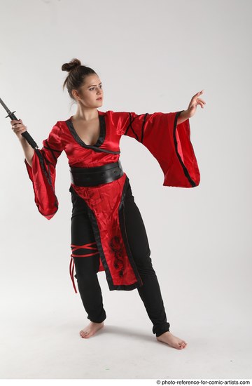 Woman Adult Average Martial art Standing poses Casual Latino