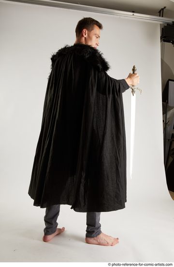 Man Adult Athletic White Fighting with sword Standing poses Coat