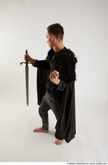 Man Adult Athletic White Fighting with sword Standing poses Coat