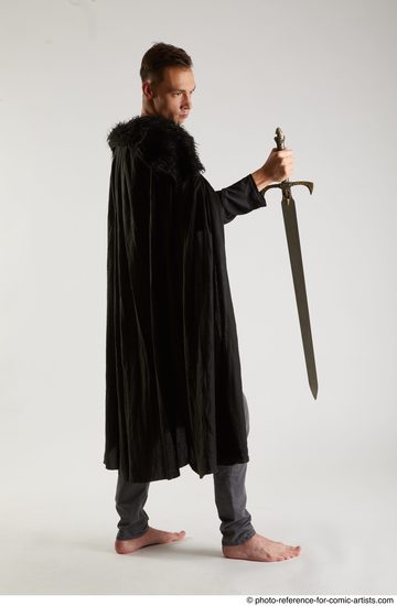 Man Adult Athletic White Fighting with sword Standing poses Coat