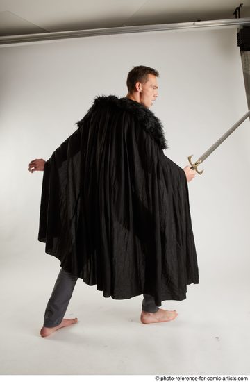 Man Adult Athletic White Fighting with sword Standing poses Coat