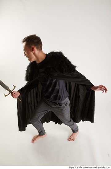 Man Adult Athletic White Fighting with sword Standing poses Coat