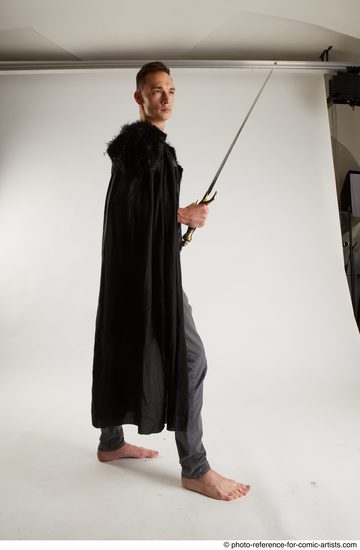 Man Adult Athletic White Fighting with sword Standing poses Coat