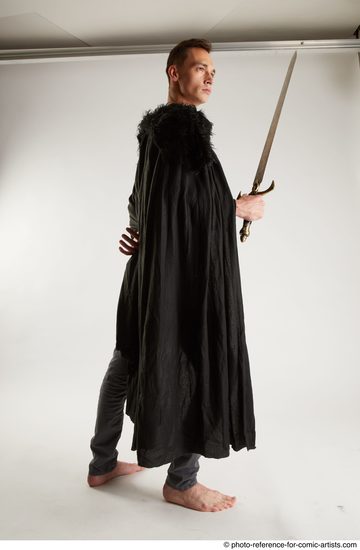 Man Adult Athletic White Fighting with sword Standing poses Coat