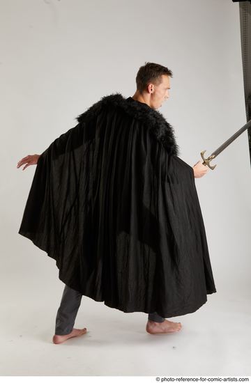 Man Adult Athletic White Fighting with sword Standing poses Coat