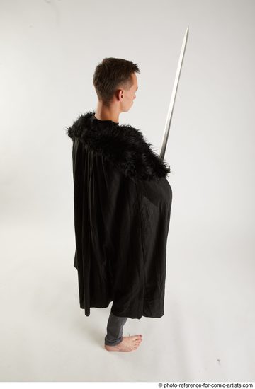 Man Adult Athletic White Fighting with sword Standing poses Coat