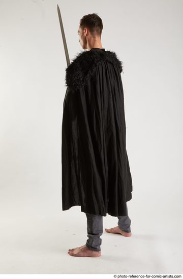 Man Adult Athletic White Fighting with sword Standing poses Coat