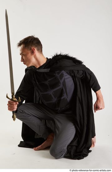 Man Adult Athletic White Fighting with sword Kneeling poses Coat