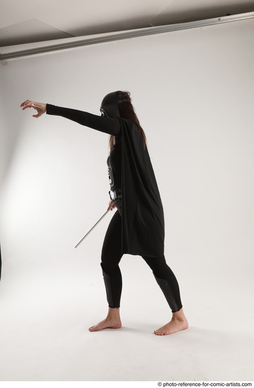 Woman Adult Average White Fighting with sword Standing poses Coat