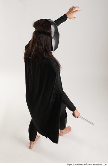 Woman Adult Average White Fighting with sword Standing poses Coat